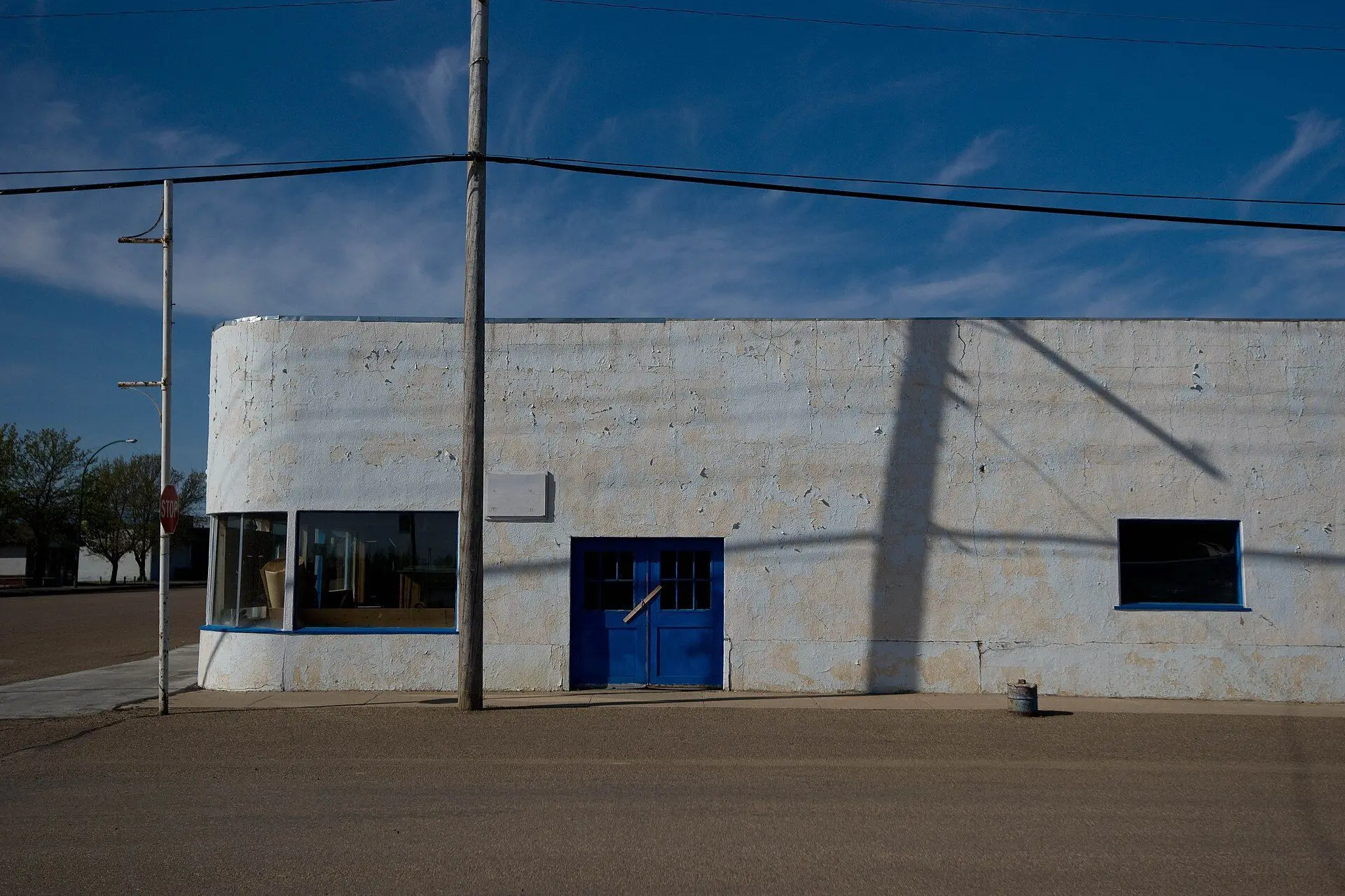 Streamline moderne corner building with blue doors